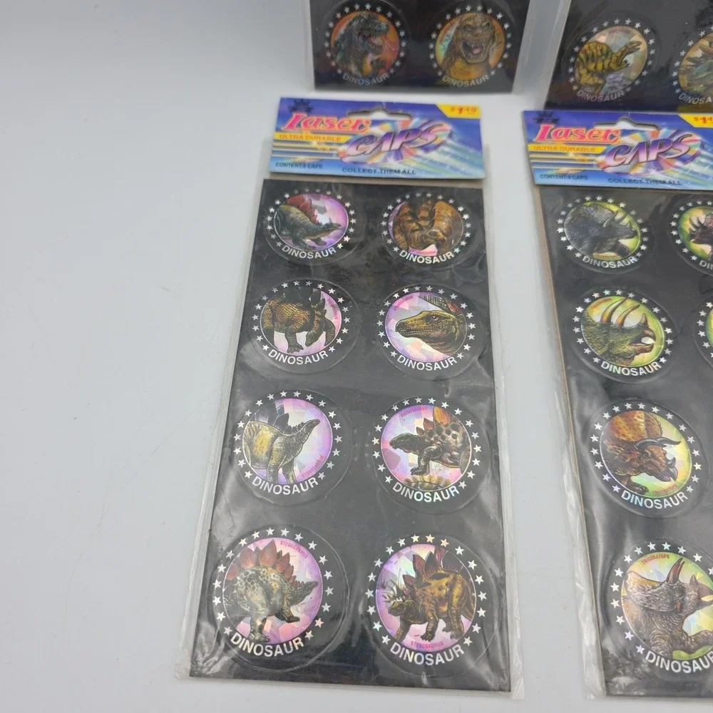 Jurassic Pogs On‎ Sheet Lot Of 32 Dinosaurs Laser Caps USA VTG NEW
